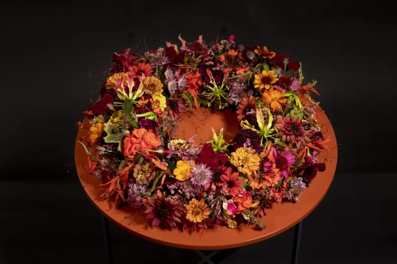 Funeral wreath with Astrantia, Gloriosa, Limonium, Scabiosa and Talinum