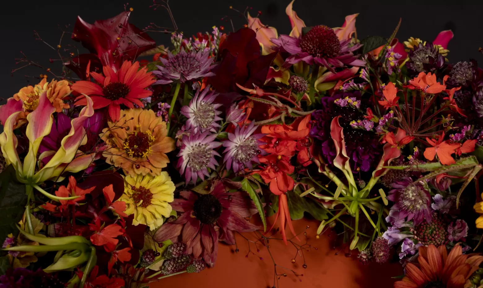 Funeral wreath with Astrantia, Gloriosa, Limonium, Scabiosa and Talinum